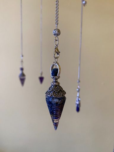Lapis Lazuli chips set in resin pendulum
